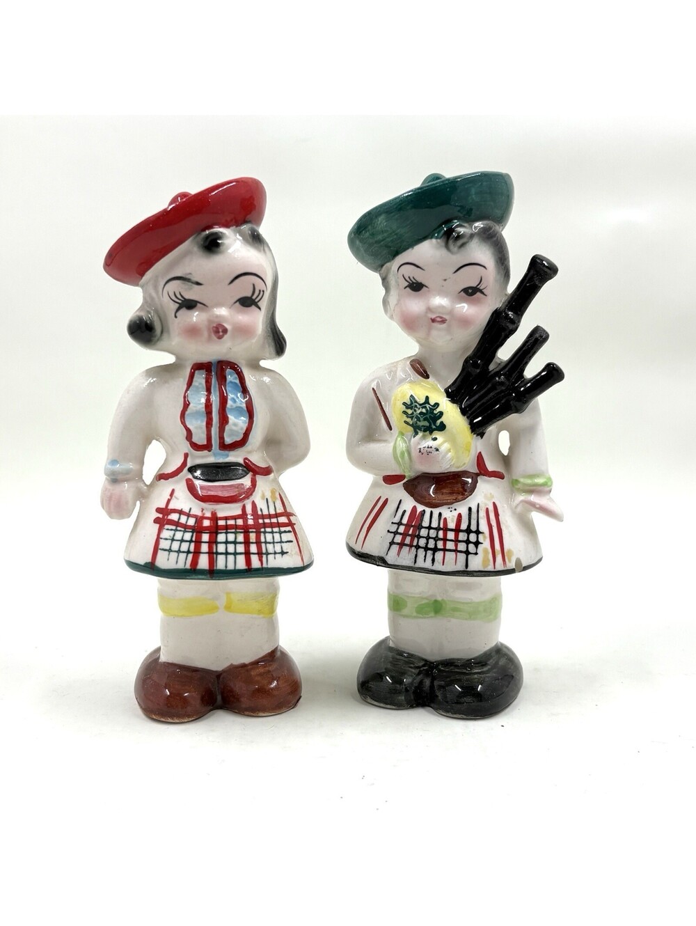 Vintage Japan Scottish Boy playing Bagpipes and Girl Salt Pepper Shakers